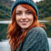 Redhead wearing Wooly Hat & Smiling